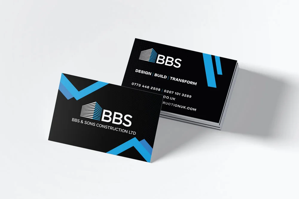 Black BBS Construction business cards with blue geometric details and the BBS logo.